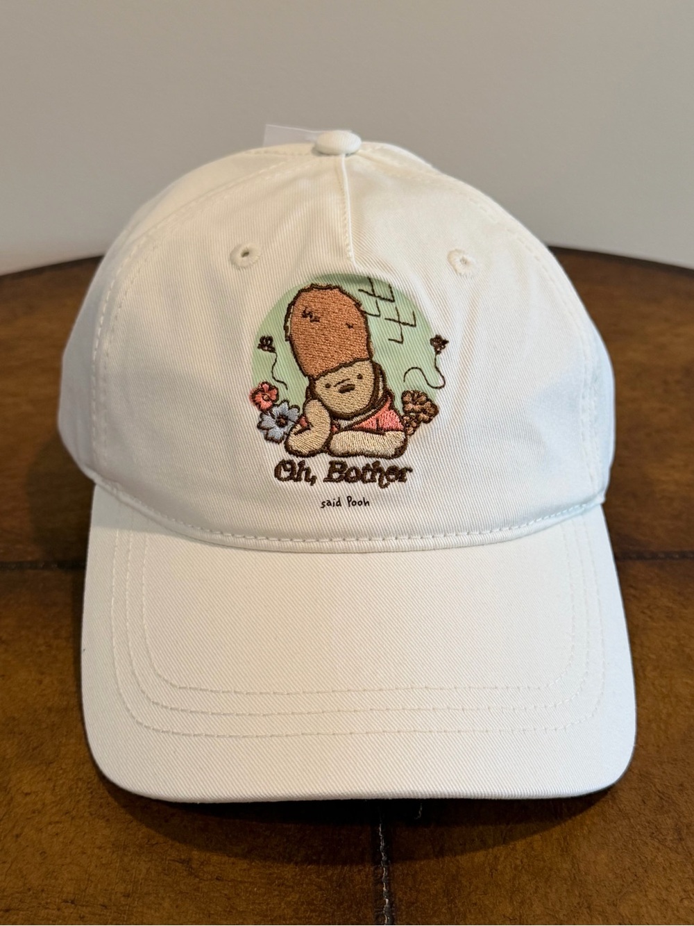 NEW 2026 DISNEY WINNIE THE POOH EPCOT UK PAVILION BASEBALL CAP